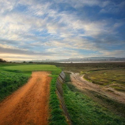The famous 9th green access by path at Royal West Norfolk Golf Club.