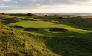 Pot bunkers surround the green at Silloth Golf Club.