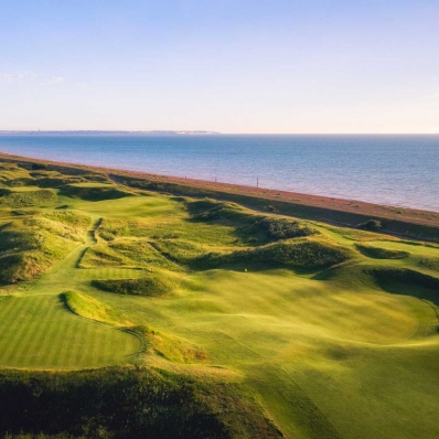 A photo of the links at Deal protected by the sea wall.