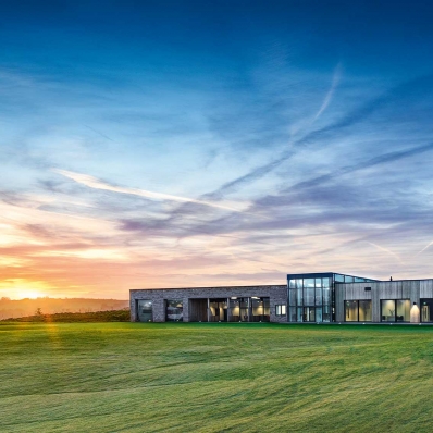 The modern clubhouse at the JCB Golf & Country Club.