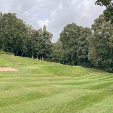 The brilliant short hole from Harry Colt at Denham Golf Club.
