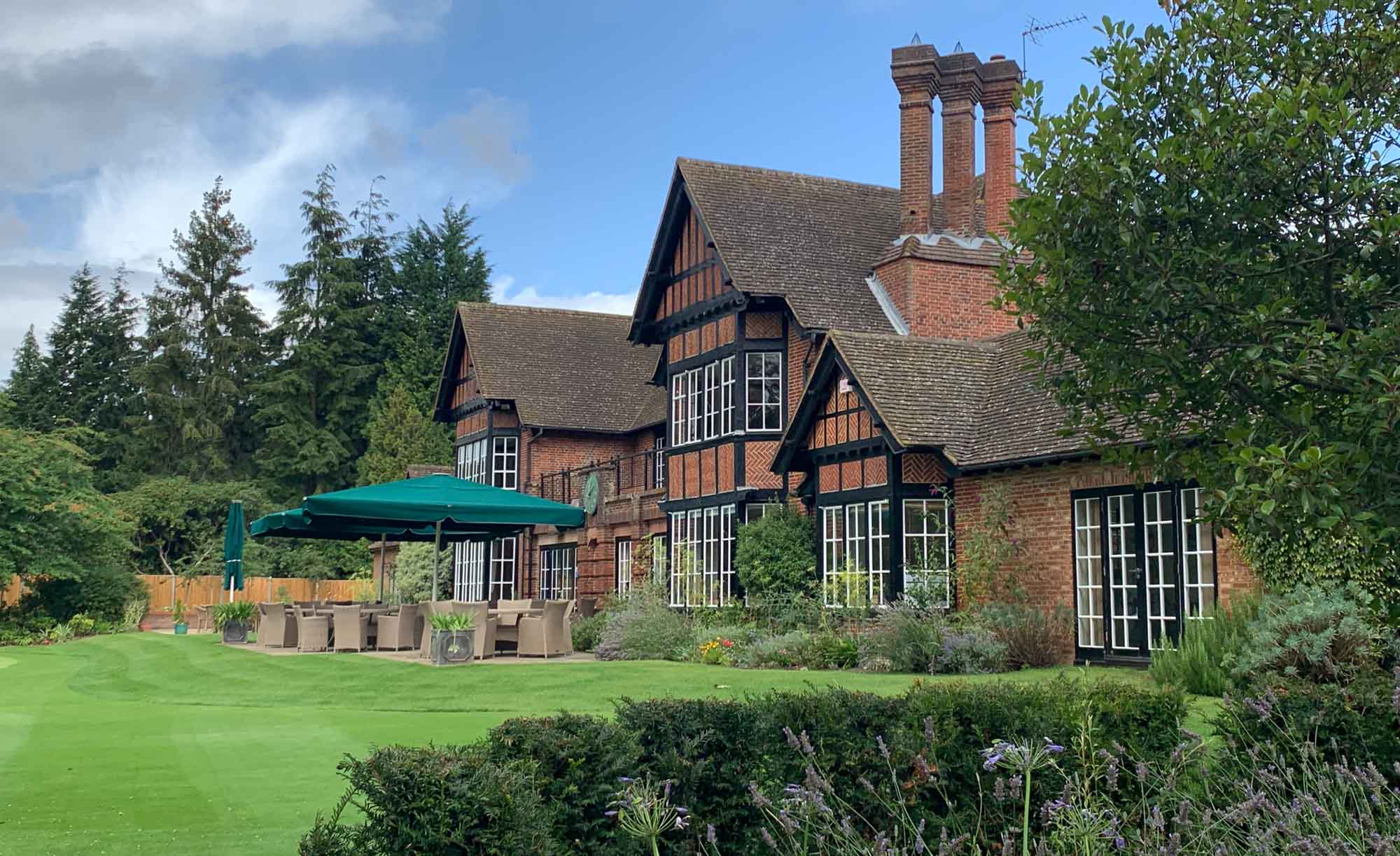The red brick clubhouse at Swinley Forest Golf Club.