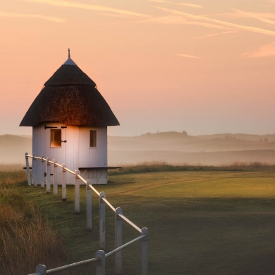 The starters hut at sunrise at Royal St Georges.