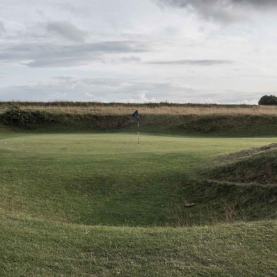 The iconic punchbowl green at Minchinhampton Old Course.