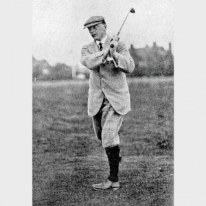 A photo of Harry Colt swinging a golf club.