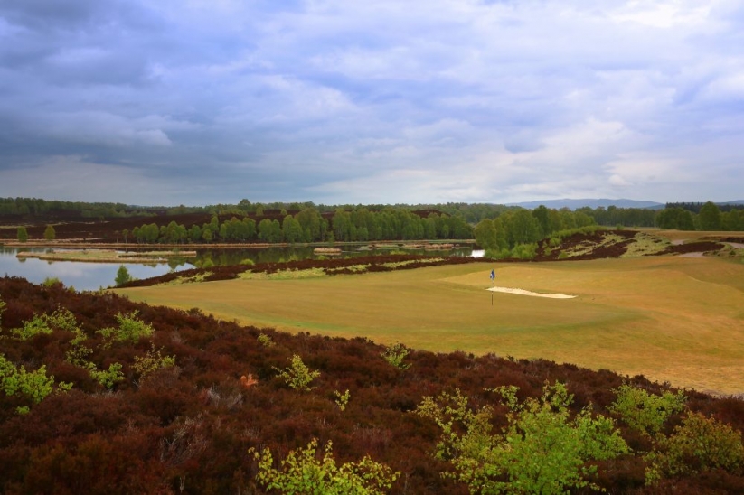 The moorland Spey Valley Golf Course in Scotland with heather in bloom.