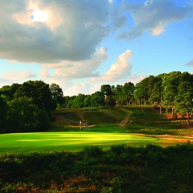 The famous 8th hole from behind at St Georges Hill Golf Club.
