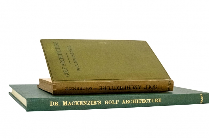 The photo shows books containing Alister MacKenzie's General Principles of golf course architecture and design.