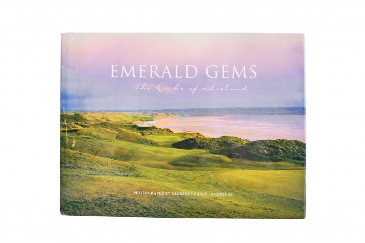 The photo shows the cover of the book Emerald Gems: The Links of Ireland by Larry Lambrecht.