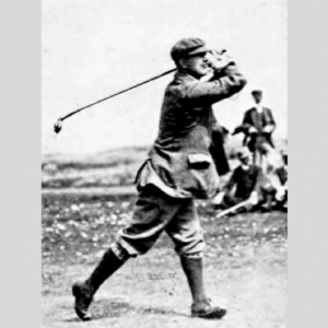 Golf Course Architect Sir Guy Campbell holding his pose after a swing.