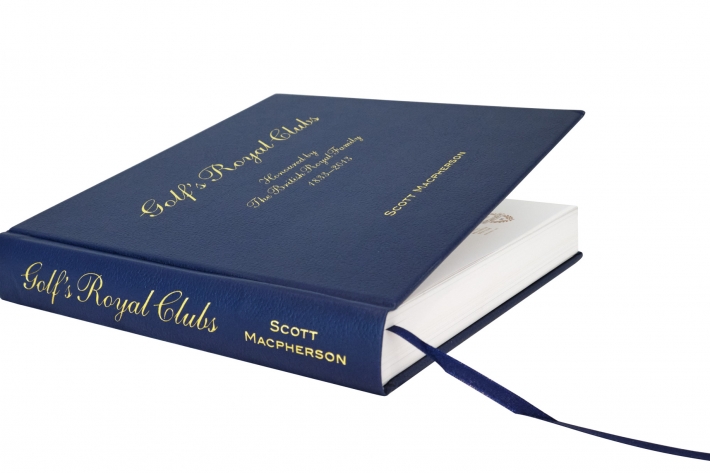 The leather bound book, Golf's Royal Clubs by Scott Macpherson.
