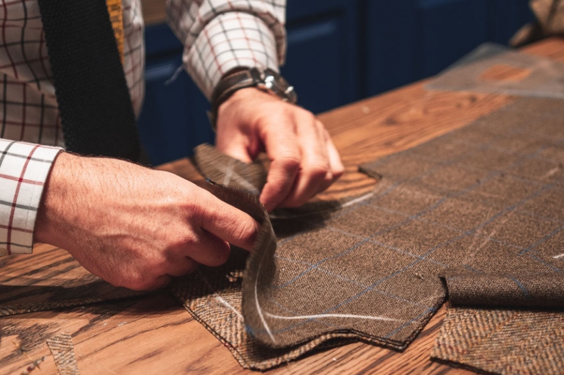 Edel custom fit putters mirror the craft of a Saville Row Tailor shown here.