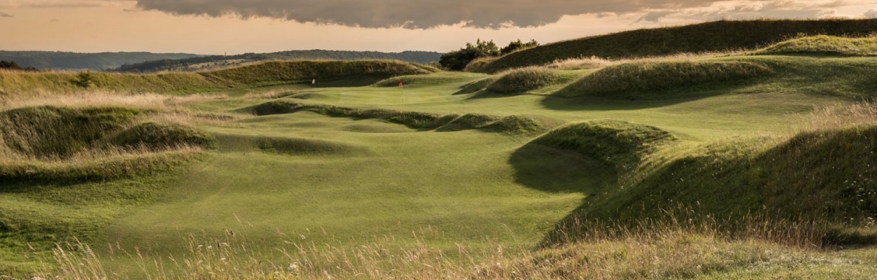 The hilltop bunkerless golf courses of England includes Painswick Golf Club shown here.